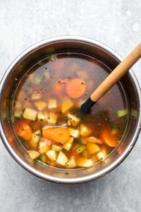 cooked potato spinach soup before adding cashew cream and spinach