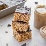 stack of rice crispy treats covered in chocolate