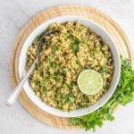 cilantro lime rice in white bowl with spoon