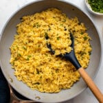 lemon orzo in sauté pan on marble countertop