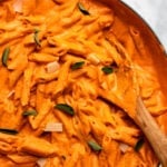 Vegan penne alla vodka in pot topped with fresh oregano