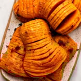 roasted honeynut squash on white serving plate