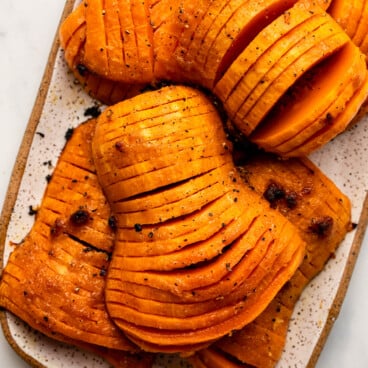 roasted honeynut squash on white serving plate
