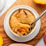 peach cobbler in small white ramekin