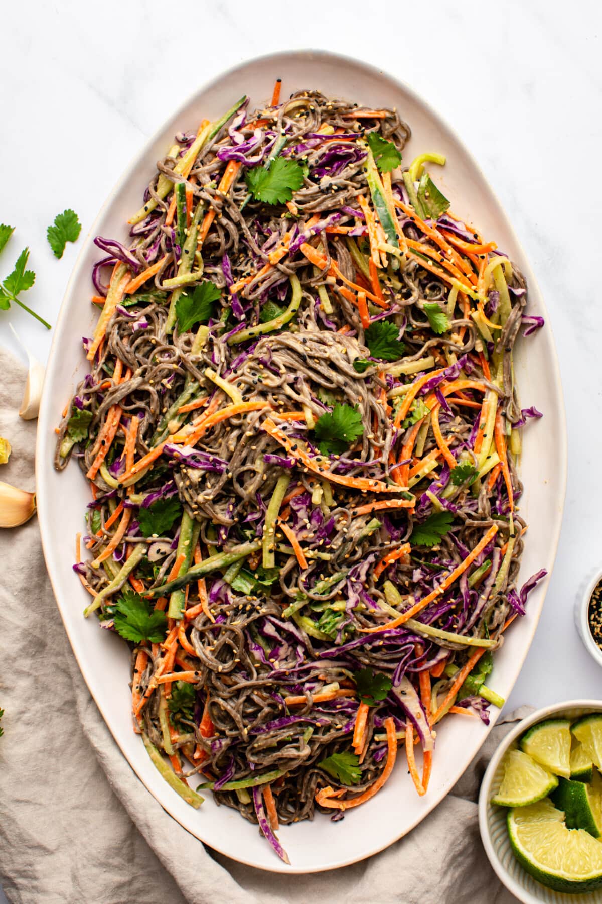 soba noodle salad served in a wide white plate