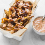 Vegan Animal Style Fries with Special Sauce in white container