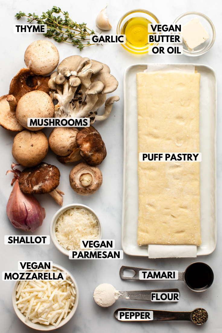 ingredients for puff pastry pinwheels in small bowls on marble countertop